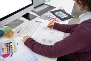 graphic-designer-making-logo-notebook